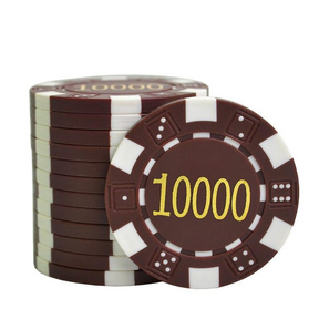 Le jeton de poker DICE marron avec la valeur 10000 inscrit au milieu.